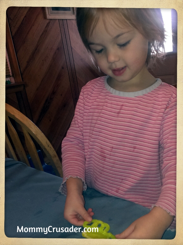 Preschooler working on her pretty pony craft. | MommyCrusader.com