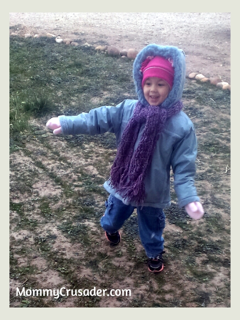 Twirling in the First Snow of the Year. | MommyCrusader.com