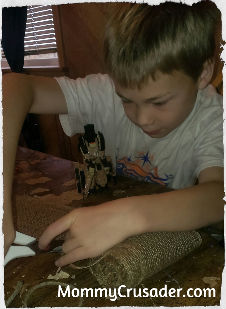 Second Grader Cutting Burlap Ribbon | MommyCrusader.com